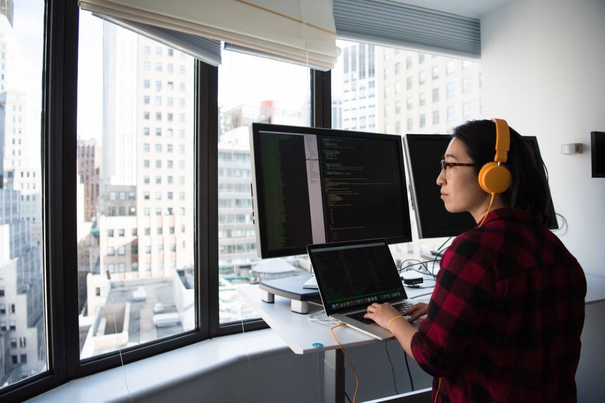a woman working with her laptop